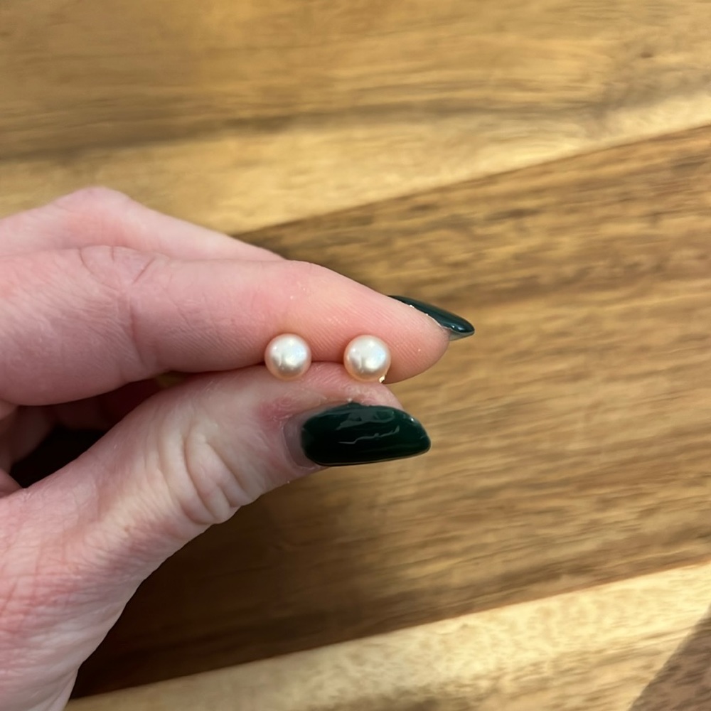 Pink pearl earrings with gold posts